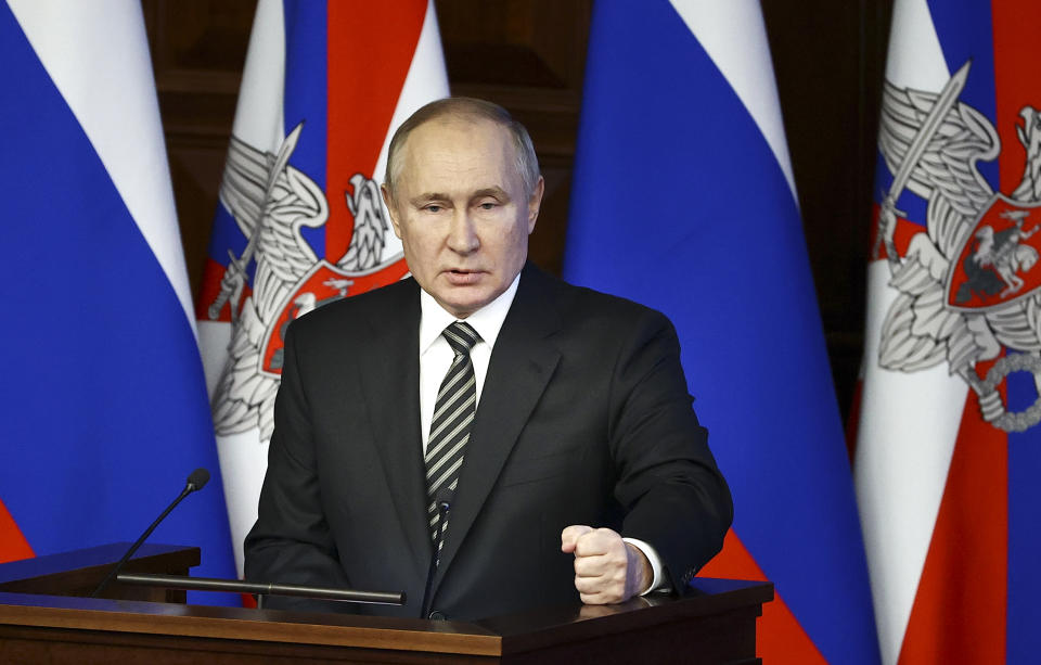 Russian President Vladimir Putin addresses an extended meeting of the Russian Defense Ministry Board at the National Defense Control Center in Moscow, Russia, Tuesday, Dec. 21, 2021. (Mikhail Tereshchenko, Sputnik, Kremlin Pool Photo via AP)