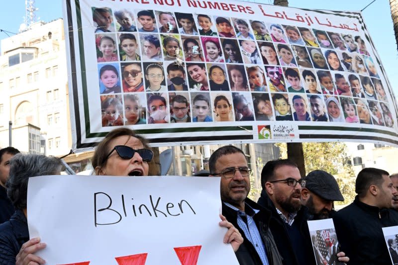 Palestinians protest the deaths of loved ones directly or indirectly resulting from the Israel-Gaza war during U.S. Secretary of State Antony Blinken's meeting with Palestinian President Mahmoud Abbas in Ramallah, West Bank, on Wednesday. Photo by Debbie Hill/ UPI