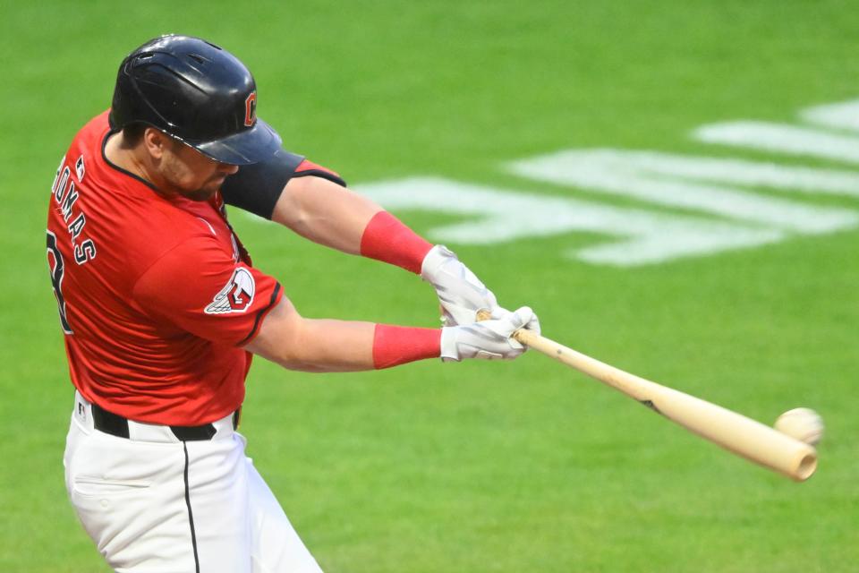 Sep 12, 2024; Cleveland, Ohio, USA; Cleveland Guardians right fielder Lane Thomas (8) hits an RBI double in the first inning against the Tampa Bay Rays at Progressive Field. Mandatory Credit: David Richard-Imagn Images