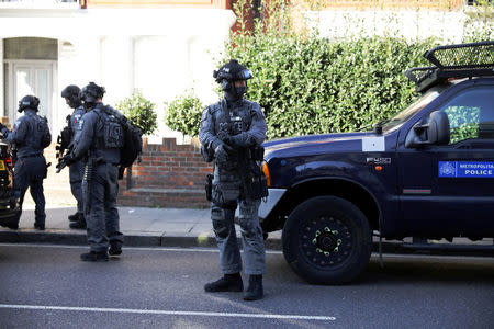 Armed policemen stand by cordon outside Parsons Green tube station in London, Britain September 15, 2017. REUTERS/Kevin Coombs