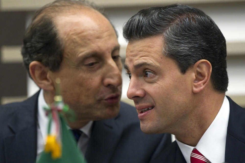 Mexico's President-elect Enrique Pena Nieto, right, listens to Paulo Skaf, president of the Sao Paulo's Industries Federation, during a meeting with businessmen, in Sao Paulo, Brazil, Wednesday, Sept. 19, 2012. (AP Photo/Andre Penner)