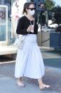 <p>Katharine McPhee grabs a drink from Cha Cha Matcha on her way to go shopping for baby clothes in West Hollywood on Monday.</p>