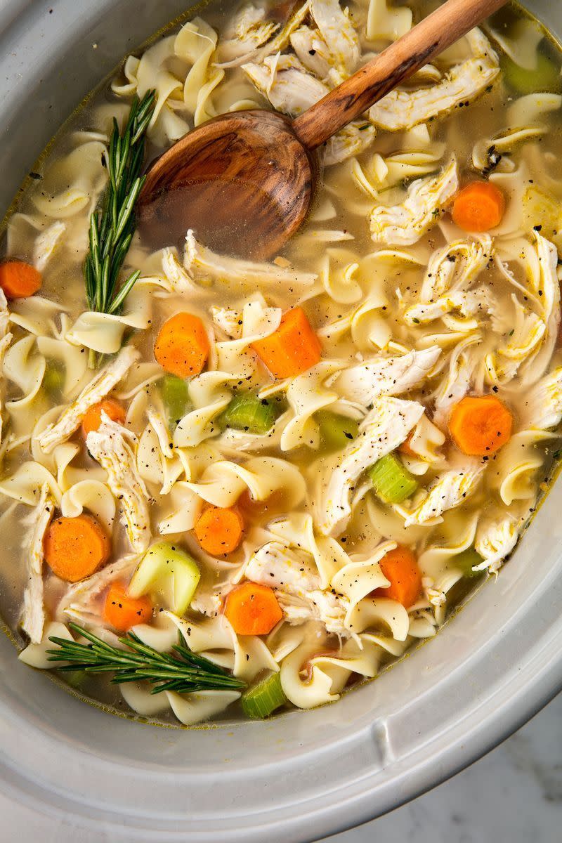 <p>The easiest way to make the most comforting meal of all time.</p><p>Get the <a href="https://www.delish.com/uk/cooking/recipes/a29124077/easy-crockpot-chicken-noodle-soup-recipe/" rel="nofollow noopener" target="_blank" data-ylk="slk:Slow Cooker Chicken Noodle Soup;elm:context_link;itc:0;sec:content-canvas" class="link ">Slow Cooker Chicken Noodle Soup</a> recipe.</p>