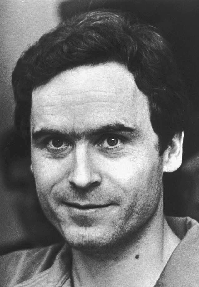 The real Ted Bundy, shown in this July 1986 file photo taken in Tallahassee, Fla., smiles and turns his eyes to the camera.