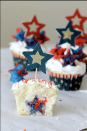 <p>Bite into these star-spangled cupcakes and you get not one, but <em>two</em> surprises: a sweet star-shaped filling inside, plus some pop rocks that add a "firecracker" snap!</p><p><em><a href="https://www.momdot.com/firecracker-surprise-inside-cupcakes/" rel="nofollow noopener" target="_blank" data-ylk="slk:Get the recipe from MomDot »;elm:context_link;itc:0;sec:content-canvas" class="link ">Get the recipe from MomDot »</a></em> </p>