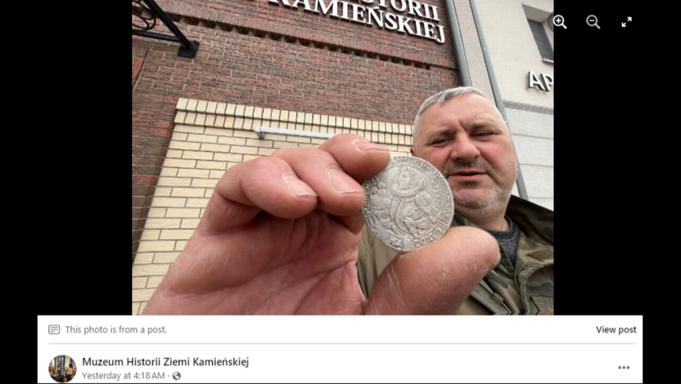 A large silver coin, about 4 centimeters across, was found in the field in Poland, the museum said. Screengrab of the Muzeum Historii Ziemi Kamieńskiej's Facebook post