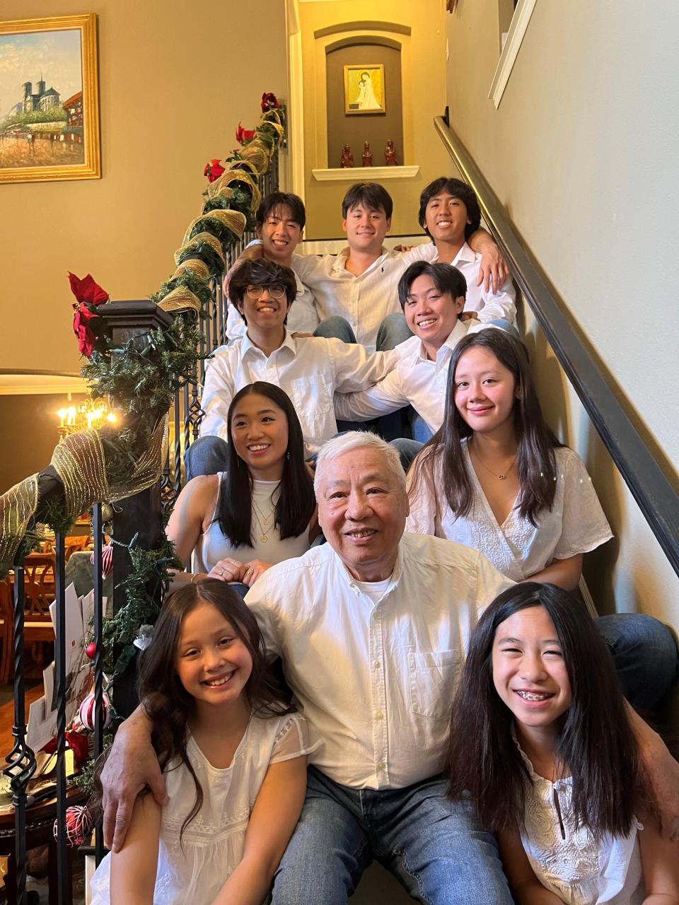 Dong Van Nguyen, 81, with his grandchildren Christmas 2023 in Plano, Texas.