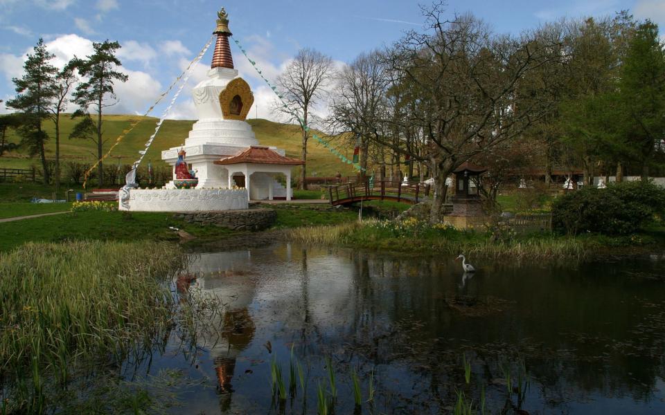 A recently-completed stupa dominates the gardens at the Samye Ling complex in Dumfriesshire - Colin McPherson/Corbis Historical