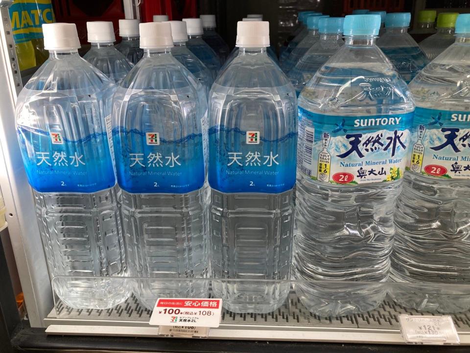 A row of water bottles inside a 7-Eleven in Japan 