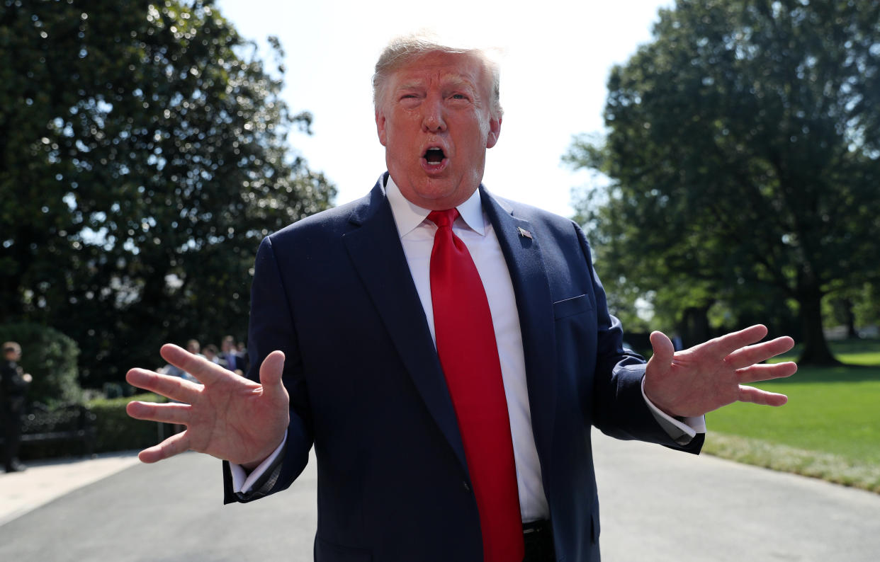 U.S. President Donald Trump talks to reporters as he departs for travel to New York and New Jersey from the South Lawn of the White House in Washington, U.S., August 9, 2019. REUTERS/Leah Millis