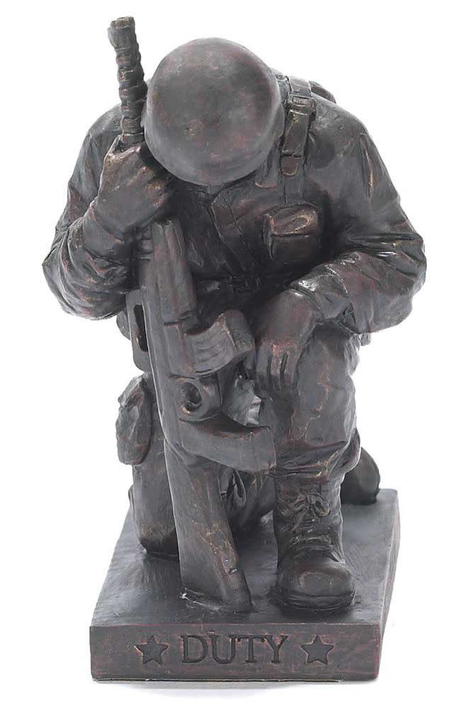 praying soldier figurine