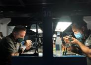 Employees work at a diamond-cutting factory in Abovyan