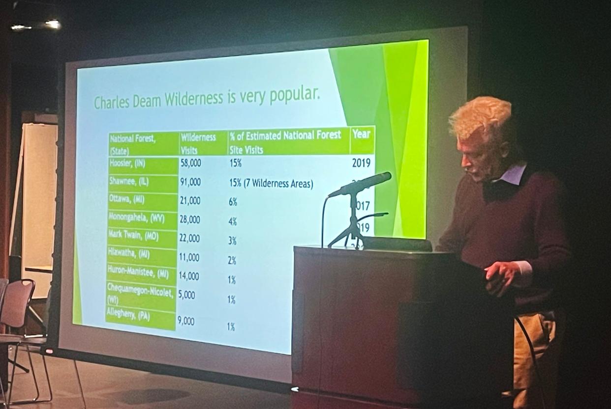 Jeff Stant, executive director of Indiana Forest Alliance, presents statistics about the Hoosier National Forest during a community forum on Monday, April 22, 2024, at the Monroe County Public Library.