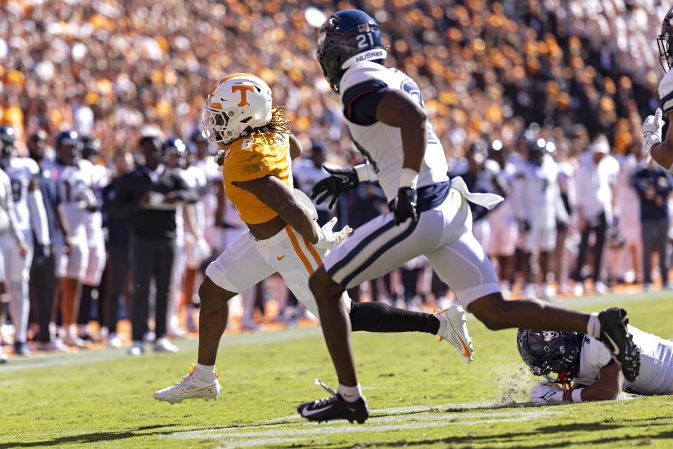 Tennessee running back Jaylen Wright (0) runs for a touchdown during the first half of an NCAA college football game against UConn Saturday, Nov. 4, 2023, in Knoxville, Tenn. (AP Photo/Wade Payne)