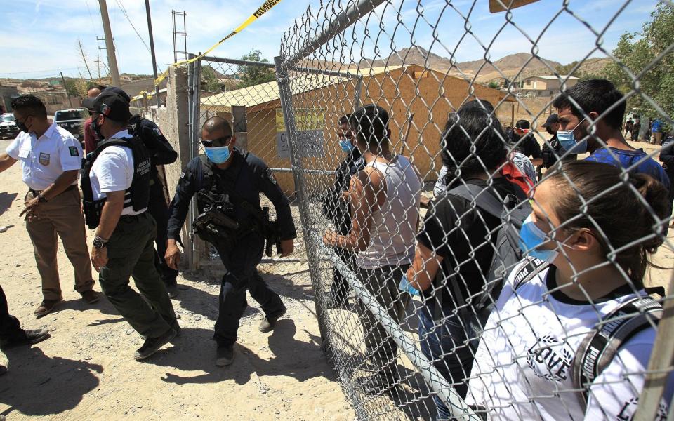 Police rescue 140 migrants kidnapped near US border, Ciudad Juarez, Mexico - Luis Torres/Shutterstock