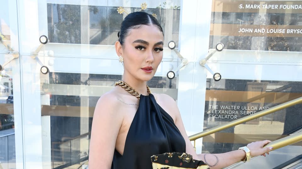 Musician Agnez Mo, who is the most awarded artist in the history of Indonesia, arrived in a black and gold look. - Araya Doheny/Getty Images