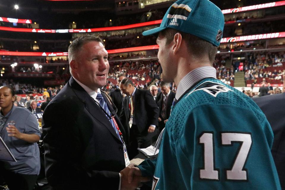 Scott Reedy meets Bryan Marchment after being selected 102nd overall by the San Jose Sharks during the 2017 NHL Draft