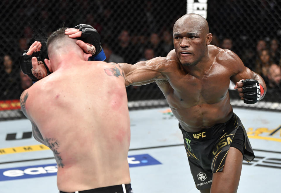 NEW YORK, NEW YORK - NOVEMBER 06: (R-L) Kamaru Usman of Nigeria punches Colby Covington in their UFC welterweight championship fight during the UFC 268 event at Madison Square Garden on November 06, 2021 in New York City. (Photo by Jeff Bottari/Zuffa LLC)