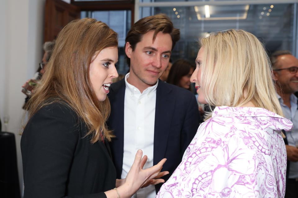 LONDON, ENGLAND - MAY 22: (L-R) HRH Princess Beatrice of York, Edoardo Mapelli Mozzi and Ruth Ganesh at the Animal Ball Art Show Private Viewing, presented by Elephant Family on May 22, 2019 in London, England. (Photo by David M. Benett/Dave Benett/Getty Images for Animal Ball)