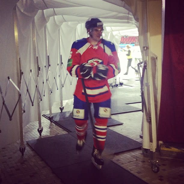 Prague Lions player walking down tunnel during KHL game. (#NickInEurope)