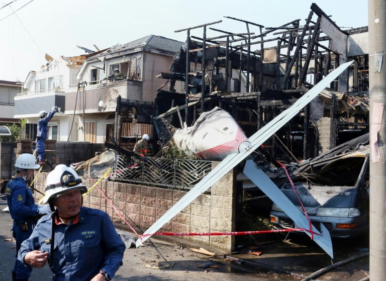 The light single-engine plane crashed into a residential area in Tokyo, setting fire to several houses and killing three people on July 26, 2015