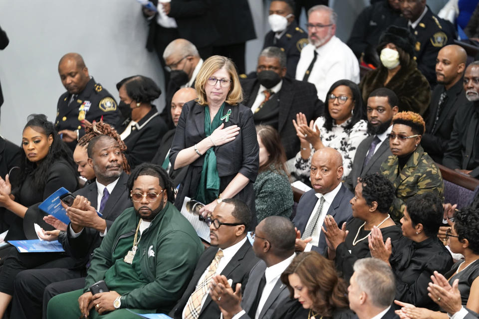 Teresa K. Woodruff, Michigan State University interim President stands at the funeral for shooting victim Arielle Anderson in Detroit, Tuesday, Feb. 21, 2023. Anderson, Alexandria Verner and Brian Fraser and were killed and several other students injured after a gunman opened fire on the campus of Michigan State University. (AP Photo/Paul Sancya)