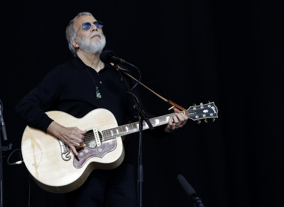 Yusuf Islam/Cat Stevens sings during a national remembrance service in Hagley Park for the victims of the March 15 mosque terrorist attack in Christchurch, New Zealand, Friday, March 29, 2019. (AP Photo/Mark Baker)