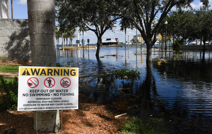 A warning sign in the aftermath of Hurricane Ian in Sanford, Fla., on Oct. 9. 