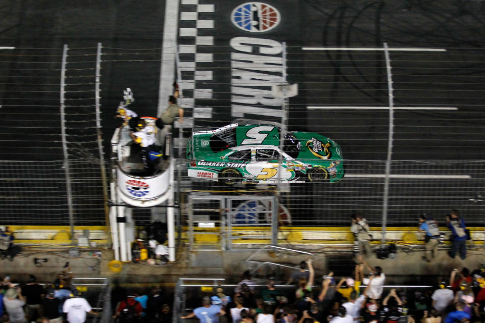 Kasey Kahne, driver of the #5 Quaker State Chevrolet, takes the checkered flag as he crosses the finish line to win the NASCAR Sprint Cup Series Coca-Cola 600 at Charlotte Motor Speedway on May 27, 2012 in Concord, North Carolina. (Photo by Streeter Lecka/Getty Images)