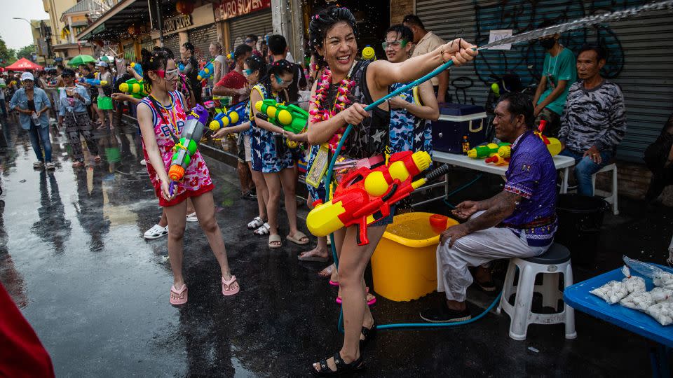 Festival goers take part in a water fight on Khao San Road on April 13, 2023. - Lauren DeCicca/Getty Images