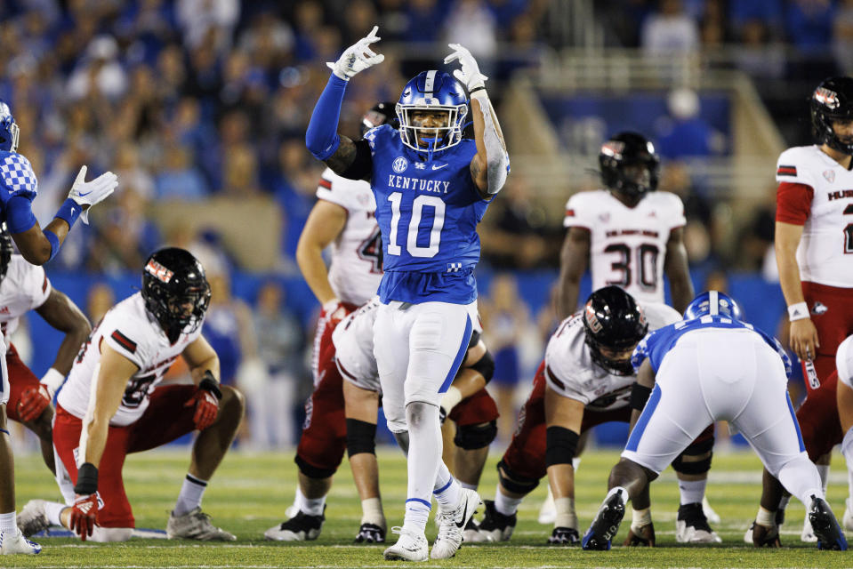 Kentucky wide receiver Chauncey Magwood (10) motions for the crowd to get louder during the first half of an NCAA college football game against Northern Illinois in Lexington, Ky., Saturday, Sept. 24, 2022. (AP Photo/Michael Clubb)