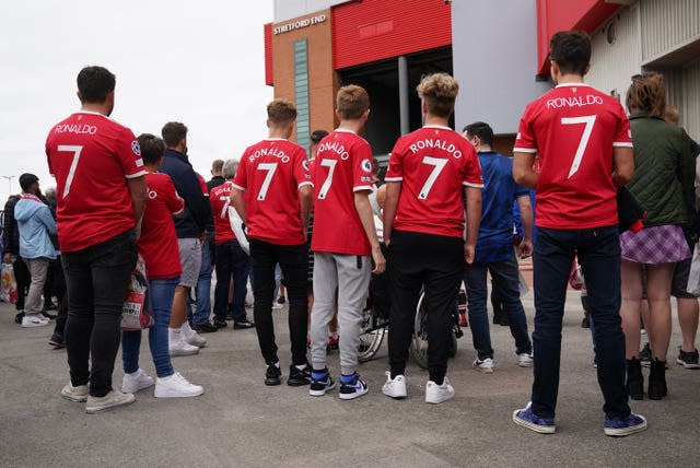 Fans wearing Ronaldo shirts before the game