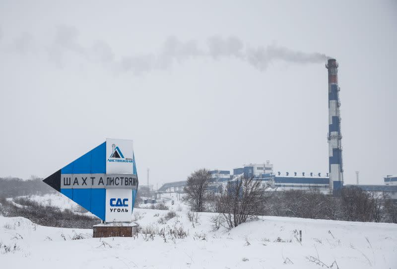 The sign of the Listvyazhnaya coal mine is seen on a roadside near the mine in Kemerovo region