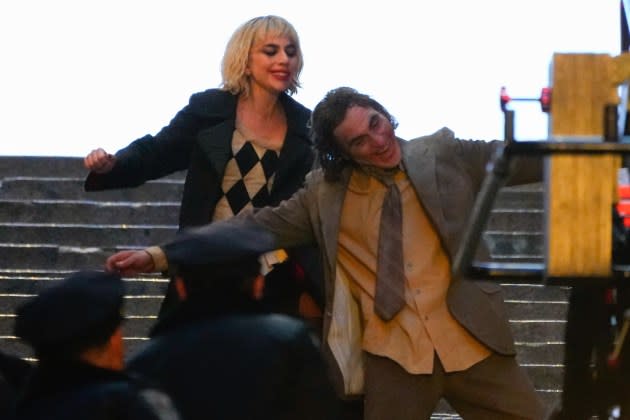 Lady Gaga and Joaquin Phoenix filming 'Joker: Folie a deux' in New York City in April 2023. - Credit: Gotham/GC Images/Getty Images