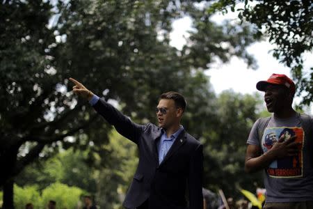 Jack Posobiec attends a rally about free speech outside of the White House in Washington, U.S., June 25, 2017. REUTERS/Carlos Barria