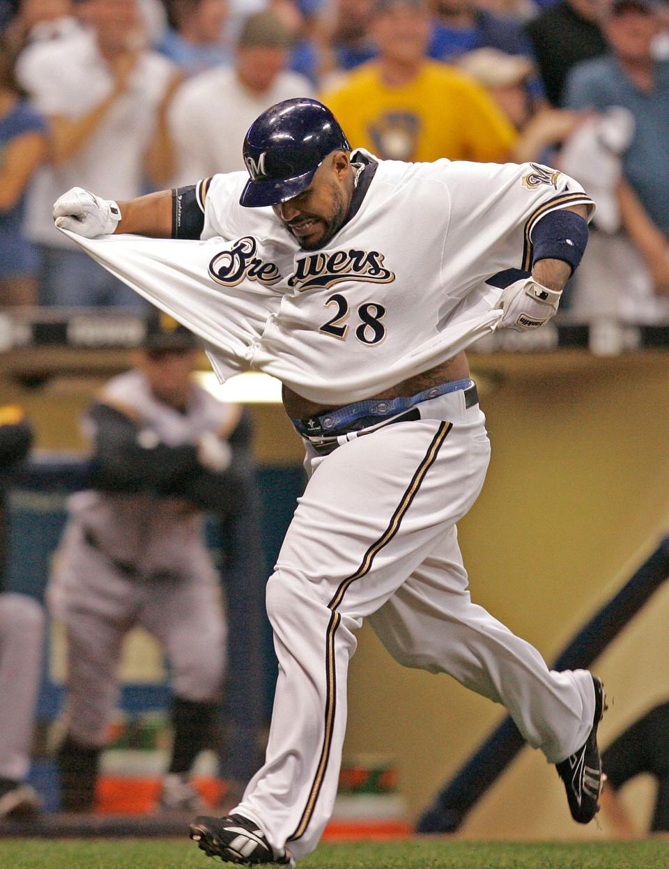 Milwaukee Brewers' Prince Fielder pulls out his shirt after hitting a walk-off home run to beat the Pittsburgh Pirates 7-5 on Sept. 23, 2008. The 2008 Brewers celebrated victories by untucking their shirts at the end of the game, in solidarity with a daily tribute centerfielder Mike Cameron paid to his father. Some other teams didn't appreciate the gesture.