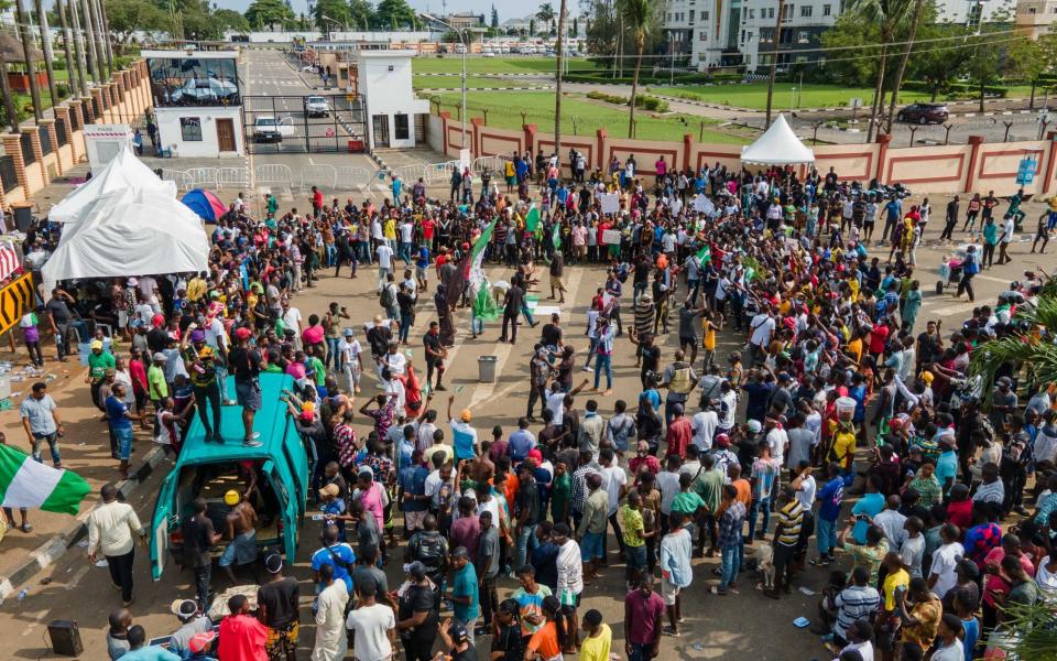 Protesters gather at the front of Alausa, the Lagos State Secretariat - AFP