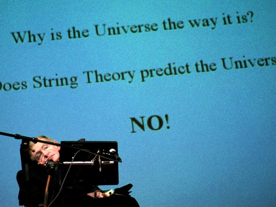 Hawking holds a lecture for a symposium of cosmologists at Stockholm University in 2003 (AP)