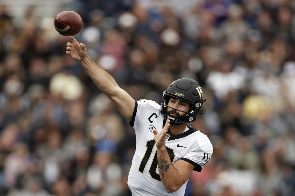 Wake Forest quarterback Sam Hartman passes against Army during the second half of an NCAA college football game Saturday, Oct. 23, 2021, in West Point, N.Y. Wake Forest won 70-56. (AP Photo/Adam Hunger)