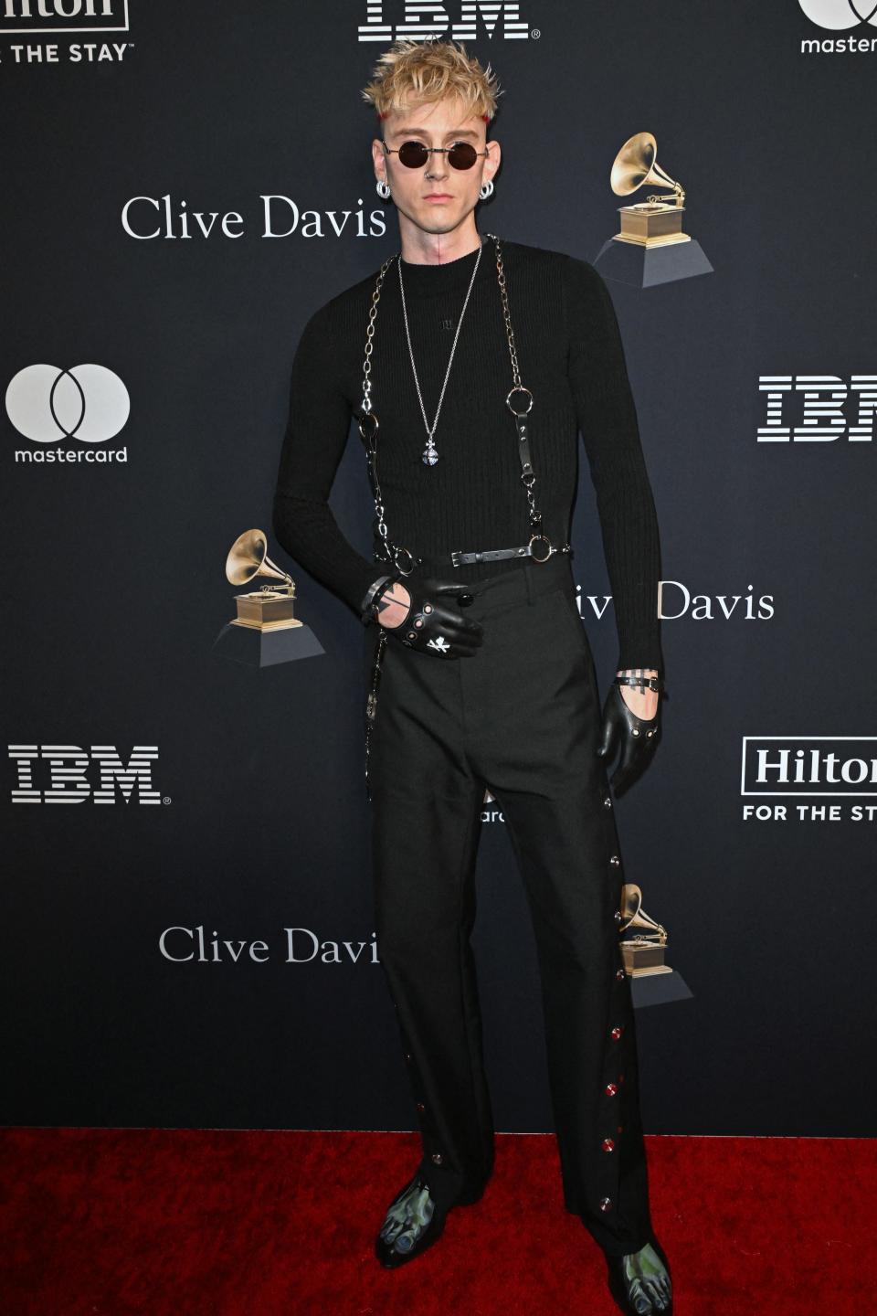 Machine Gun Kelly arrives for the Recording Academy and Clive Davis' Salute To Industry Icons pre-Grammy gala at the Beverly Hilton hotel in Beverly Hills, California on February 3, 2024.