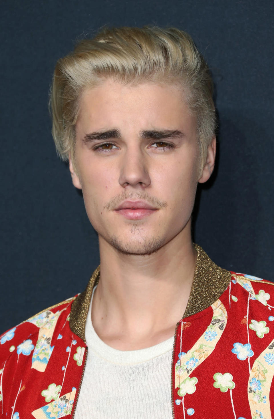 <p>Singer Justin Bieber is notorious for going viral for his changing hairstyles, and we imagine some teens are swooning at his platinum blonde pompadour. <i>(Photo: Getty Images)</i><br></p>