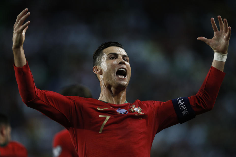 Cristiano Ronaldo of Portugal celebrates his goal during the Euro 2020 qualifying match football match between Portugal v Luxembourg. (Credit: Getty Images)