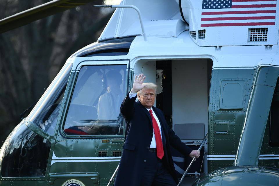 Outgoing President Donald Trump waves as he boards Marine One at the White House in Washington, D.C., on Jan. 20.<span class="copyright">Mandel Ngan—AFP/Getty Images</span>