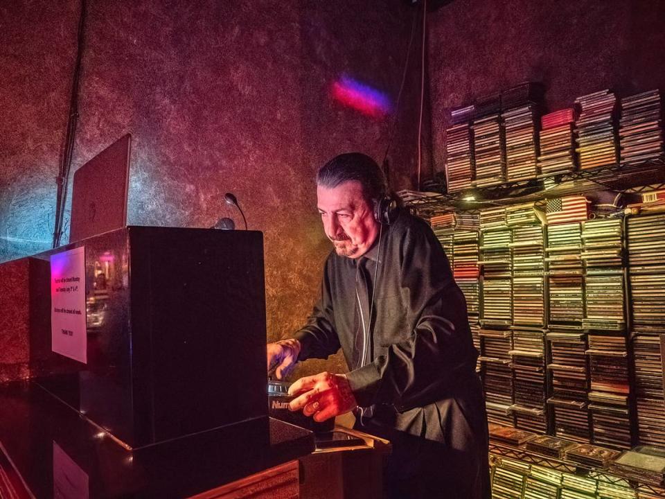 DJ Kent Freeman creates his mix at the Touche nightclub.