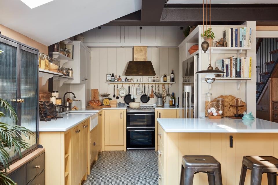 small pale yellow kitchen