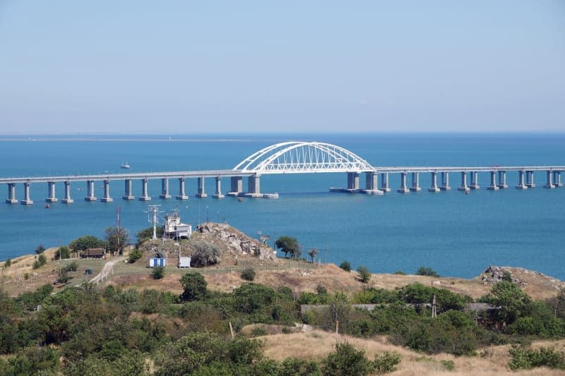 The 19-kilometre-long Crimean Bridge, also known as the Kerch Bridge, over which trains run - including to Sevastopol - connects the Black Sea peninsula with the Russian mainland. Ulf Mauder/dpa