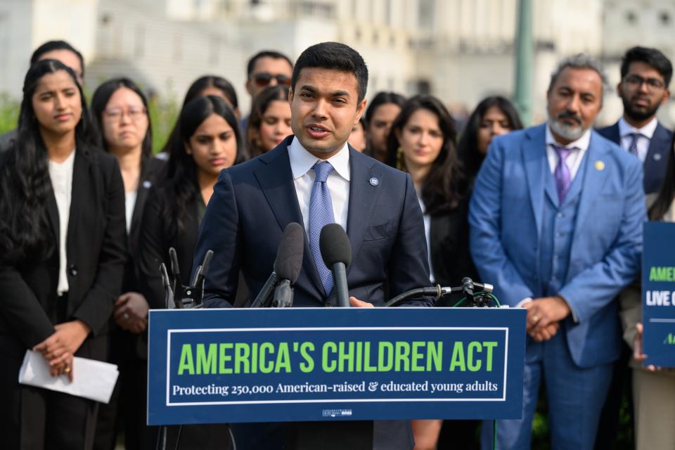 Dip Patel, founder of advocacy group Improve the Dream, speaks at a news conference at the U.S. Capitol. His organization is advocating for legislation that would protect children from “aging out” of their parents’ visas at 21 years old.