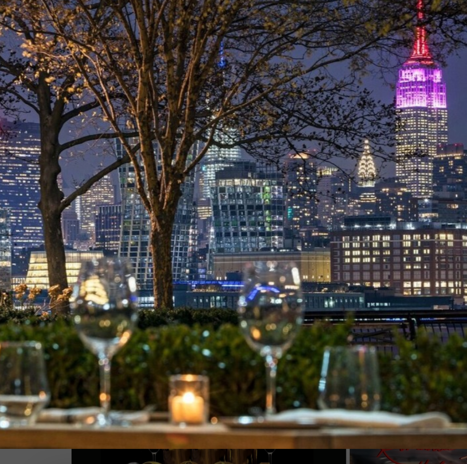 The outdoor dining area at Halifax overlooks the New York City skyline.