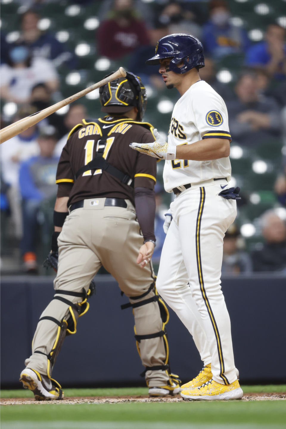 Milwaukee Brewers shortstop Willy Adames tosses his bat after striking out against the San Diego Padres during the third inning of a baseball game Thursday, May 27, 2021, in Milwaukee. (AP Photo/Jeffrey Phelps)