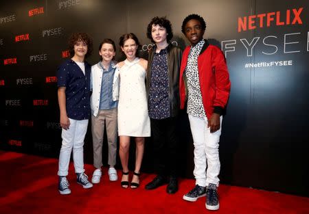 Cast members Gaten Matarazzo, Noah Schnapp, Millie Bobby Brown, Finn Wolfhard and Caleb McLaughlin from the television series "Stranger Things" poses during a Netflix/Fysee event in Beverly Hills, California U.S., June 6, 2017. REUTERS/Mario Anzuoni/Files